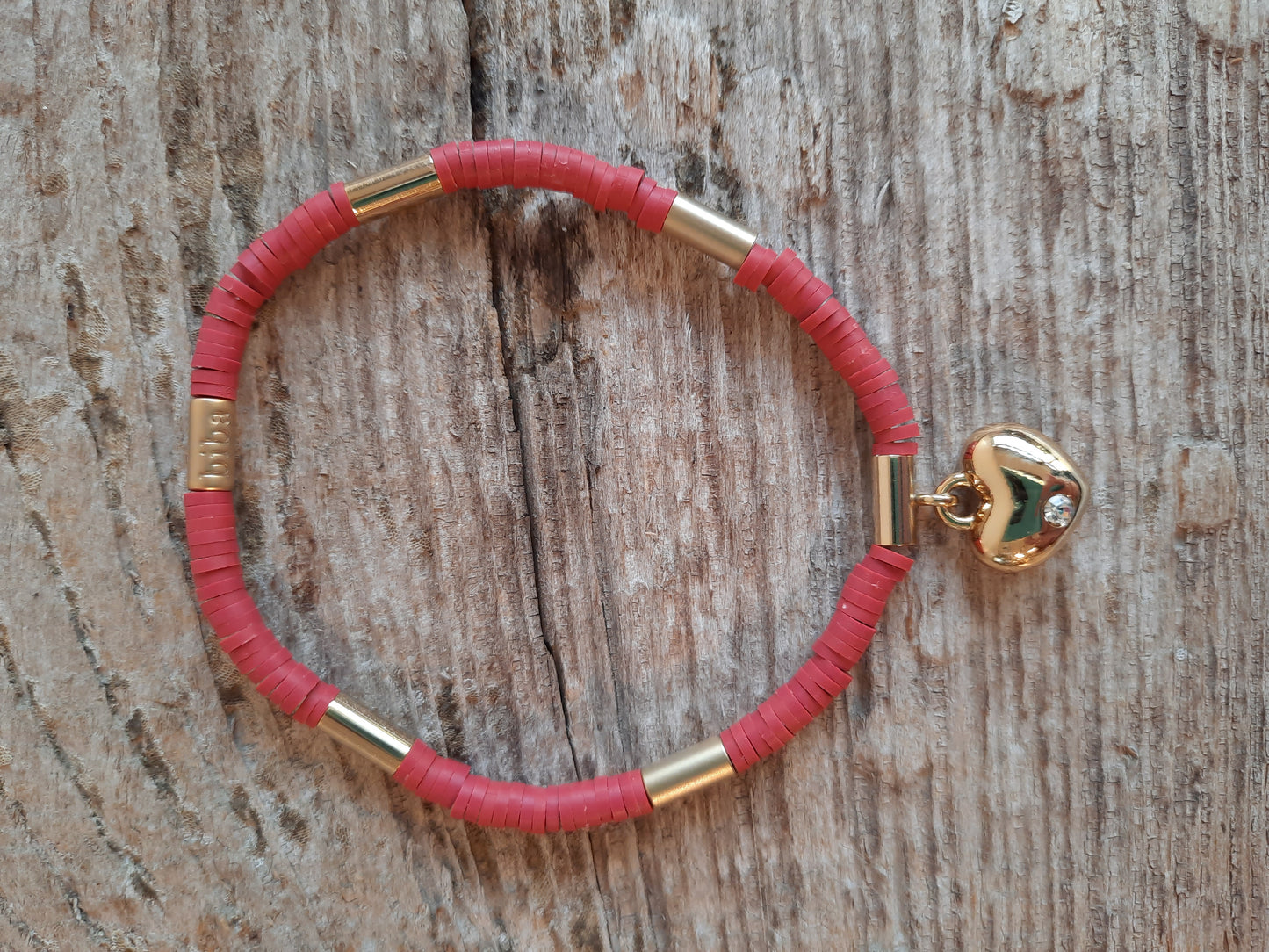 Armband mit goldenem Herz